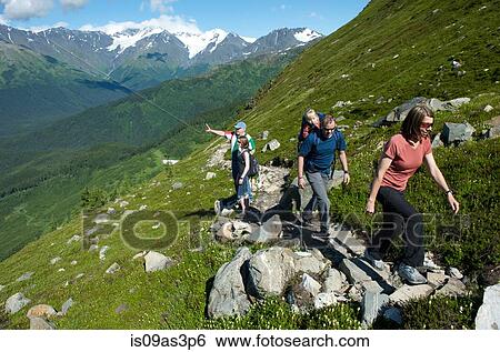 Group of people hiking, North Face Trail, Alyeska Prince Hotel, Alyeska Resort, seven glaciers, Winner Creek Valley, Turnagain Arm, Mt. Alyeska, Girdwood, Alaska, USA View Large Photo Image Stock Photograph - Group of people hiking, North Face Trail, Alyeska Prince Hotel, Alyeska Resort, seven glaciers, Winner Creek Valley, Turnagain Arm, Mt. Alyeska, Girdwood, Alaska, USA. Fotosearch