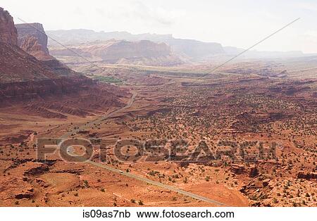 High angle view of distant rural road in valley, Capitol Reef National Park, Torrey, Utah, USA View Large Photo Image Stock Image - High angle view of distant rural road in valley, Capitol Reef National Park, Torrey, Utah, USA. Fotosearch