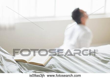 Mid adult man in yoga position View Large Photo Image Stock Image - Mid adult man in yoga position. Fotosearch