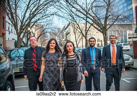 Portrait of five smartly dressed young adult friends walking along street View Large Photo Image Stock Image - Portrait of five smartly dressed young adult friends walking along street. Fotosearch