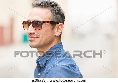 Portrait of mid adult man, outdoors View Large Photo Image Stock Photograph - Portrait of mid adult man, outdoors. Fotosearch