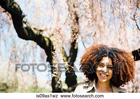 Portrait of mid adult woman, looking at camera, smiling, head and shoulders View Large Photo Image Stock Photo - Portrait of mid adult woman, looking at camera, smiling, head and shoulders. Fotosearch