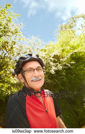 Stock Photography - Portrait of senior man cyclist. Fotosearch