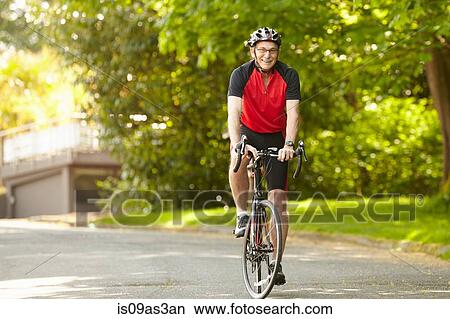 Picture - Senior man on bicycle. Fotosearch