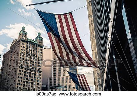 View of buildings and American flags, Manhattan, New York, USA View Large Photo Image Stock Image - View of buildings and American flags, Manhattan, New York, USA. Fotosearch