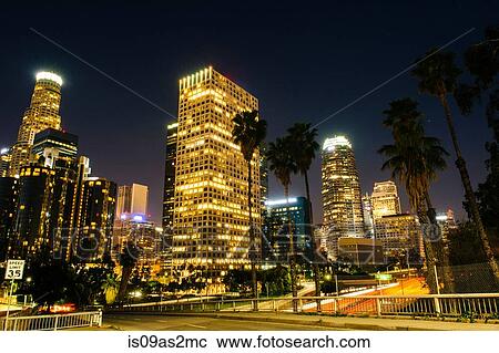 View of highway and city skyline at night, Los Angeles, California, USA View Large Photo Image Stock Image - View of highway and city skyline at night, Los Angeles, California, USA. Fotosearch