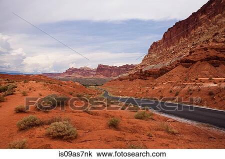 View of rock formations and rural road in Capitol Reef National Park, Torrey, Utah, USA View Large Photo Image Stock Image - View of rock formations and rural road in Capitol Reef National Park, Torrey, Utah, USA. Fotosearch
