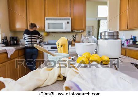 Woman baking in kitchen View Large Photo Image Stock Image - Woman baking in kitchen. Fotosearch