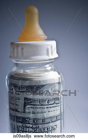 Baby bottle filled with 100 dollar bills View Large Photo Image Stock Photograph - Baby bottle filled with 100 dollar bills. Fotosearch