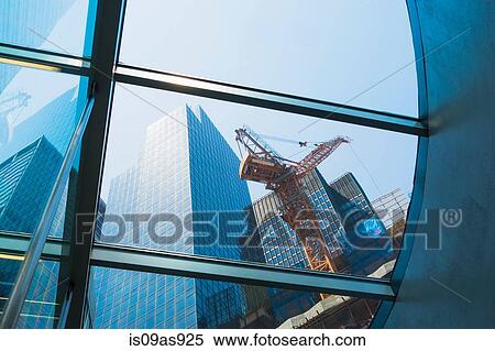 Stock Photography - Building being constructed, low angle view, New York, USA. Fotosearch