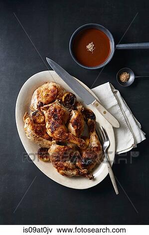 'Day of the Dead' food with roasted chicken and mole poblano sauce View Large Photo Image Stock Photo - 'Day of the Dead' food with roasted chicken and mole poblano sauce. Fotosearch