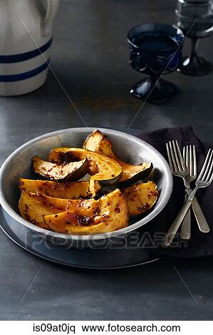 Stock Photography - 'Day of the Dead' food with sweet & spicy acorn squash. Fotosearch