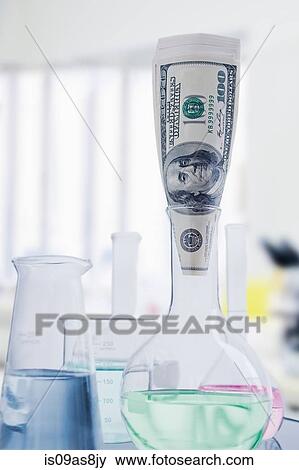 One hundred dollar bill in flat bottomed glass chemistry flask View Large Photo Image Stock Photo - One hundred dollar bill in flat bottomed glass chemistry flask. Fotosearch