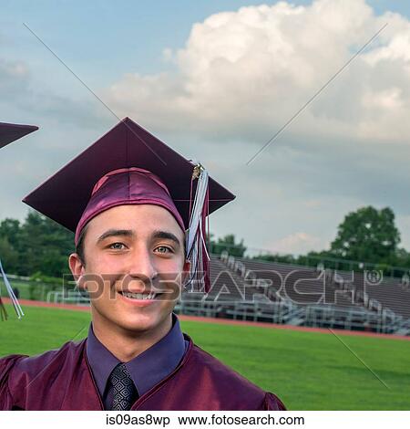 Stock Photography - Portrait of student at graduation. Fotosearch