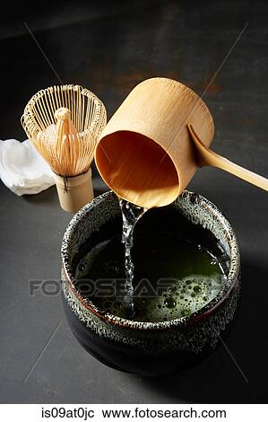 Pouring matcha tea with traditional bamboo tools View Large Photo Image Stock Image - Pouring matcha tea with traditional bamboo tools. Fotosearch