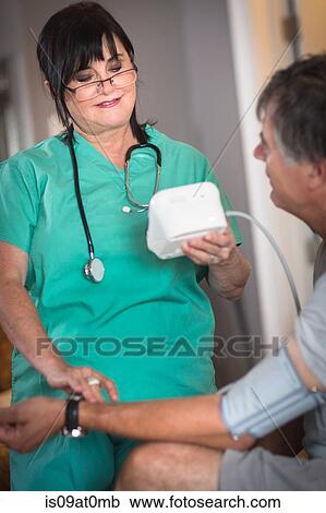 African Doctor Nurse Checking Patients Pulse Stock Photo 