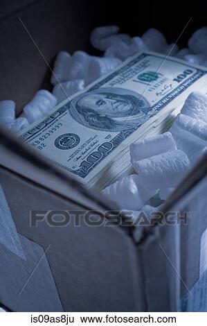 Stack of one hundred dollar bill in cardboard box with foam packing peanuts View Large Photo Image Stock Photograph - Stack of one hundred dollar bill in cardboard box with foam packing peanuts. Fotosearch