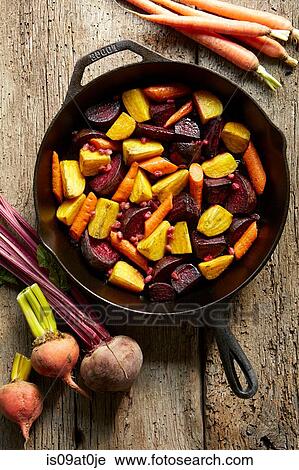 Still life of roasted golden and red beets with carrots in pan View Large Photo Image Stock Image - Still life of roasted golden and red beets with carrots in pan. Fotosearch