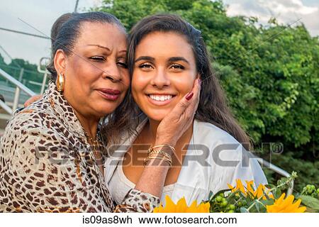 Students celebrate graduation with friend View Large Photo Image Stock Image - Students celebrate graduation with friend. Fotosearch