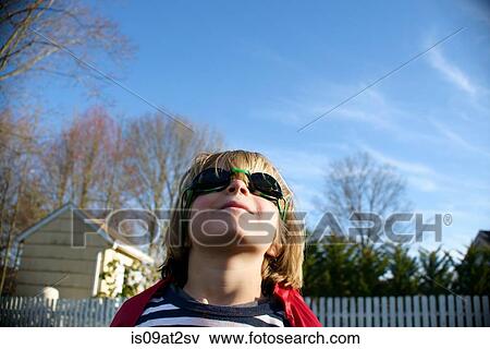 Boy in superhero goggles View Large Photo Image Stock Photo - Boy in superhero goggles. Fotosearch