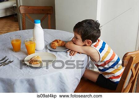 Boy waiting for breakfast View Large Photo Image Stock Photography - Boy waiting for breakfast. Fotosearch