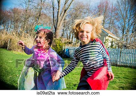 Children in costumes playing outdoors View Large Photo Image Stock Image - Children in costumes playing outdoors. Fotosearch
