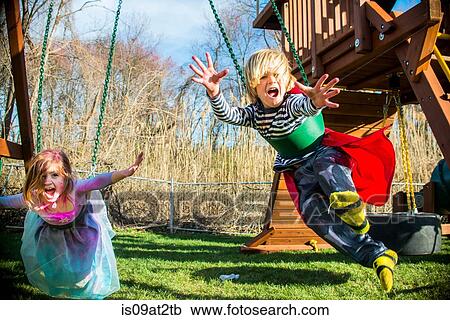 Children in costumes playing outdoors View Large Photo Image Stock Image - Children in costumes playing outdoors. Fotosearch
