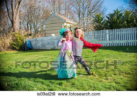 Children in costumes playing outdoors View Large Photo Image Stock Photo - Children in costumes playing outdoors. Fotosearch