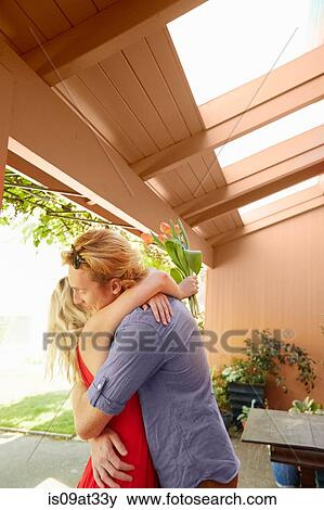 Couple hugging outdoors View Large Photo Image Stock Photo - Couple hugging outdoors. Fotosearch
