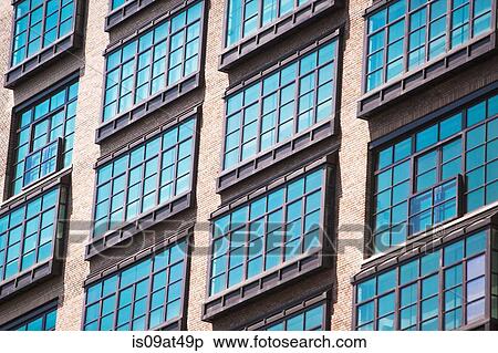 "Detail of apartment windows of old industrial building, Manhattan, New York, USA" View Large Photo Image Stock Photography - "Detail of apartment windows of old industrial building, Manhattan, New York, USA". Fotosearch