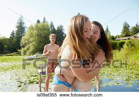 "Friends having fun at lake, Seattle, Washington, USA" View Large Photo Image Stock Photography - "Friends having fun at lake, Seattle, Washington, USA". Fotosearch