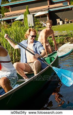 "Friends rowing boat in lake, Seattle, Washington, USA" View Large Photo Image Stock Photo - "Friends rowing boat in lake, Seattle, Washington, USA". Fotosearch