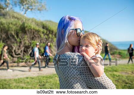 "Mother and baby enjoying sun, El Capitan, California, USA" View Large Photo Image Stock Photograph - "Mother and baby enjoying sun, El Capitan, California, USA". Fotosearch