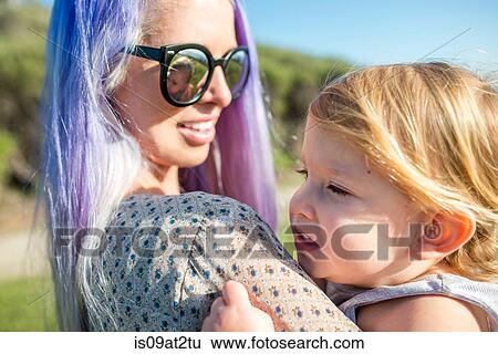 "Mother and baby enjoying sun, El Capitan, California, USA" View Large Photo Image Stock Photograph - "Mother and baby enjoying sun, El Capitan, California, USA". Fotosearch