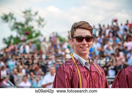 Portrait of young man at graduation ceremony View Large Photo Image Stock Photography - Portrait of young man at graduation ceremony. Fotosearch
