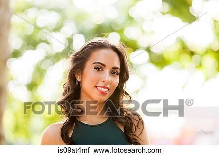 Stock Image - Portrait of young woman. Fotosearch