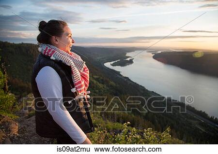 "Woman enjoying view on hill, Angel's Rest, Columbia River Gorge, Oregon, USA" View Large Photo Image Stock Photograph - "Woman enjoying view on hill, Angel's Rest, Columbia River Gorge, Oregon, USA". Fotosearch