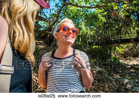 "Women hiking in forest, El Capitan, California, USA" View Large Photo Image Stock Image - "Women hiking in forest, El Capitan, California, USA". Fotosearch