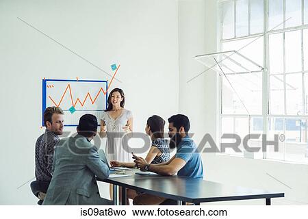 Business people in brainstorming meeting View Large Photo Image Picture - Business people in brainstorming meeting. Fotosearch