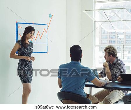 Business people in brainstorming meeting View Large Photo Image Stock Image - Business people in brainstorming meeting. Fotosearch