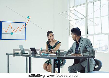 Business people in brainstorming meeting View Large Photo Image Stock Image - Business people in brainstorming meeting. Fotosearch