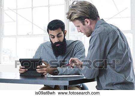 Business people in brainstorming meeting View Large Photo Image Stock Image - Business people in brainstorming meeting. Fotosearch