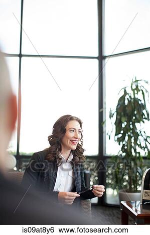 Business woman waiting in airport lounge View Large Photo Image Stock Photograph - Business woman waiting in airport lounge. Fotosearch