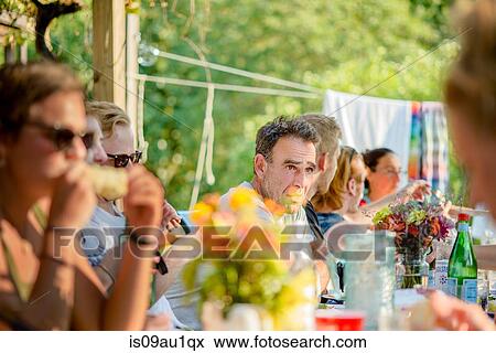Family gathering at tomato eating festival View Large Photo Image Stock Photo - Family gathering at tomato eating festival. Fotosearch