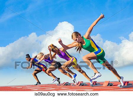 Four female athletes on athletics track, starting race View Large Photo Image Stock Image - Four female athletes on athletics track, starting race. Fotosearch