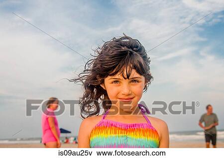 Stock Photo - Girl at the beach. Fotosearch