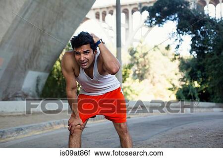 Jogger exhausted, taking break, Arroyo Seco Park, Pasadena, California, USA View Large Photo Image Stock Image - Jogger exhausted, taking break, Arroyo Seco Park, Pasadena, California, USA. Fotosearch