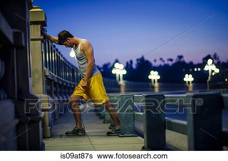 Jogger stretching on bridge, Arroyo Seco Park, Pasadena, California, USA View Large Photo Image Stock Photograph - Jogger stretching on bridge, Arroyo Seco Park, Pasadena, California, USA. Fotosearch