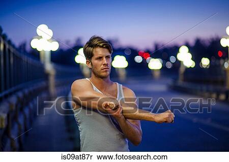 Jogger stretching on bridge, Arroyo Seco Park, Pasadena, California, USA View Large Photo Image Stock Photography - Jogger stretching on bridge, Arroyo Seco Park, Pasadena, California, USA. Fotosearch
