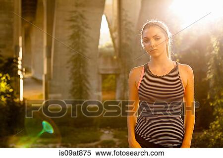 Stock Photography - Jogger sullen under arch bridge, Arroyo Seco Park, Pasadena, California, USA. Fotosearch